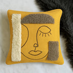 Marigold Yellow Abstract Face Embroidered Slub Cushion Cover
