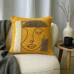 Marigold Yellow Abstract Face Embroidered Slub Cushion Cover